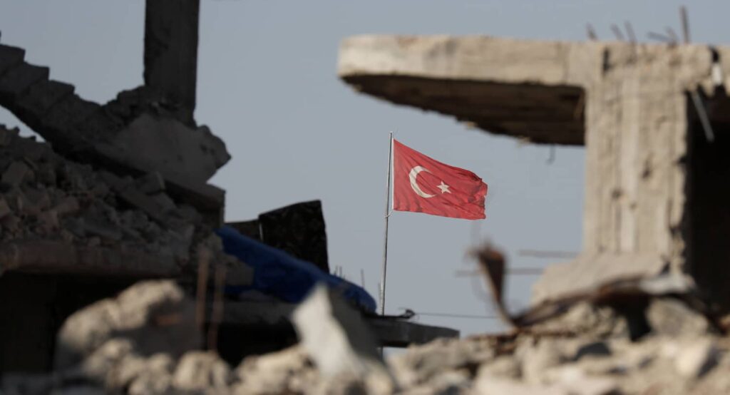 Turkey’s border gate in Kobani, as pictured from the Syrian side, after the fighting with ISIS. Photo credit: REUTERS.
